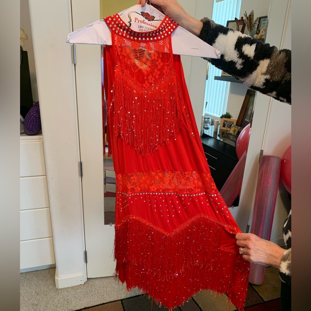 Two red sparkly fringe dance dresses